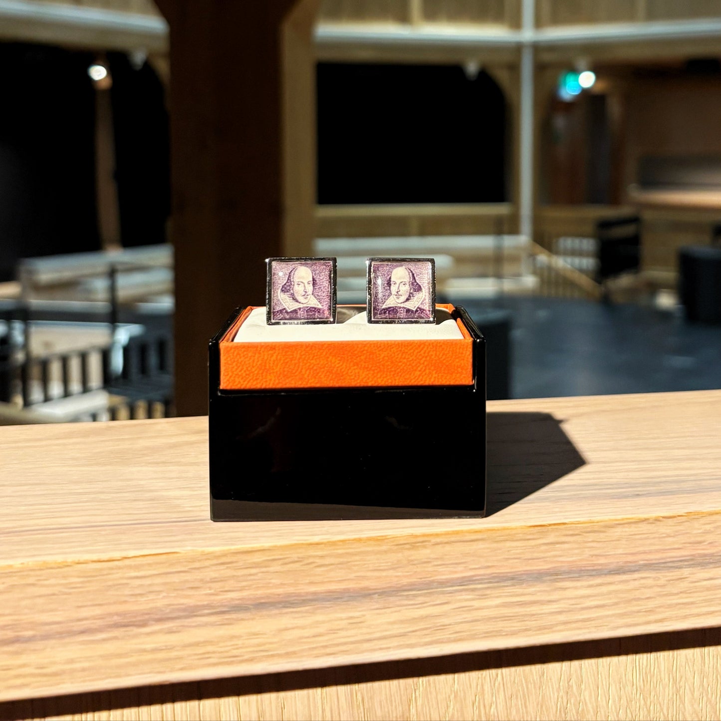Cufflinks featuring Shakespeare's portrait.