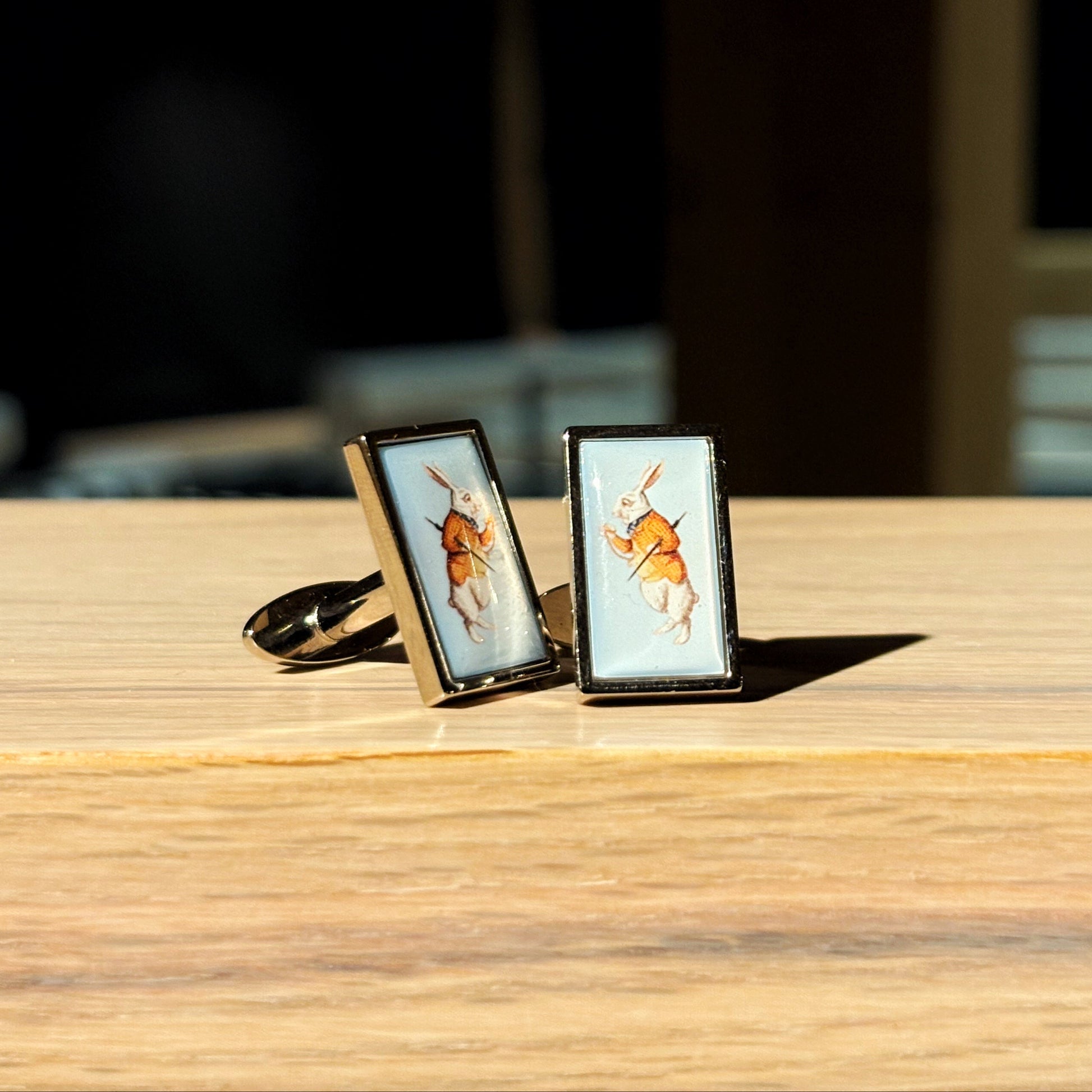 Cufflinks featuring the White Rabbit from Alice in Wonderland.