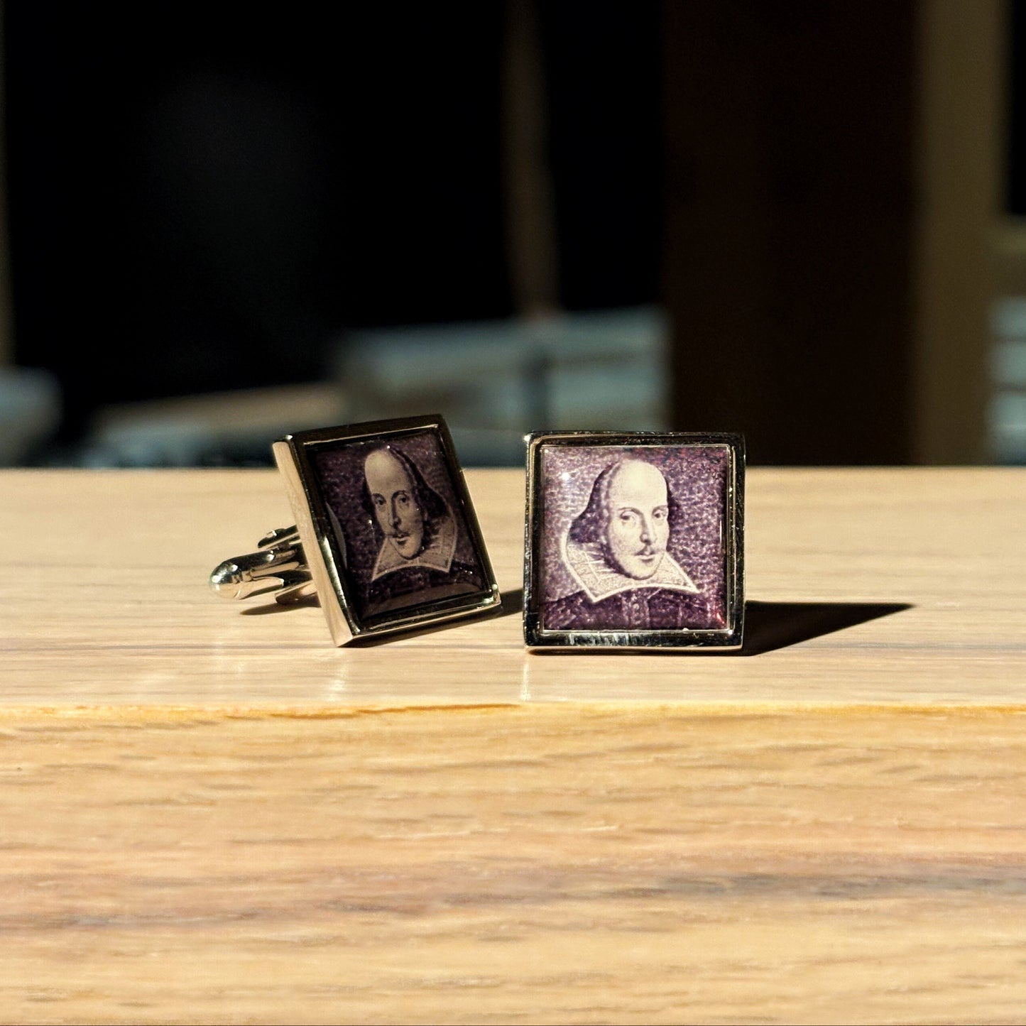 Cufflinks featuring Shakespeare's portrait.