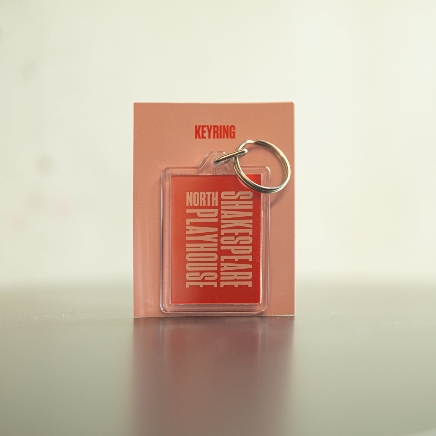 Shakespeare North Playhouse Branded Keyring - Red