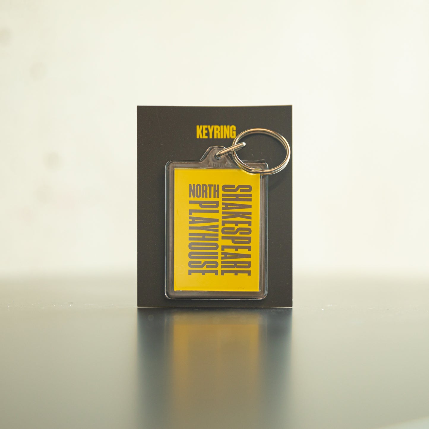 Shakespeare North Playhouse Branded Keyring - Yellow