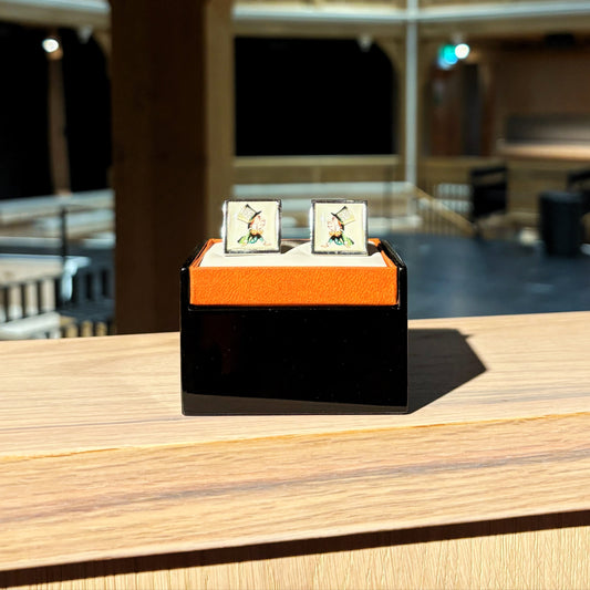 Cufflinks featuring the Mad Hatter from Alice in Wonderland.