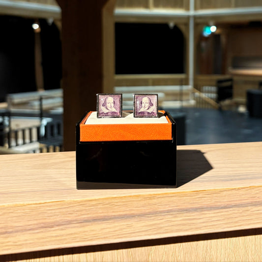 Cufflinks featuring Shakespeare's portrait.